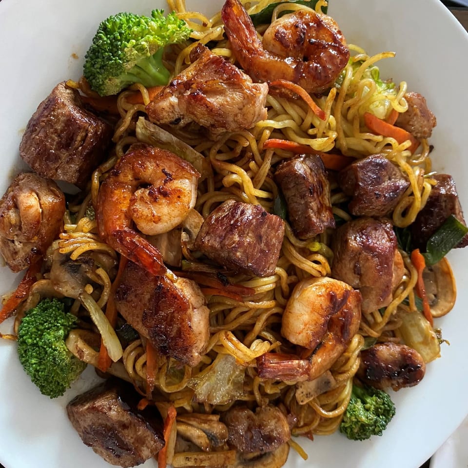 Combo Yakisoba with noodles, shrimp, meat, and vegetables.